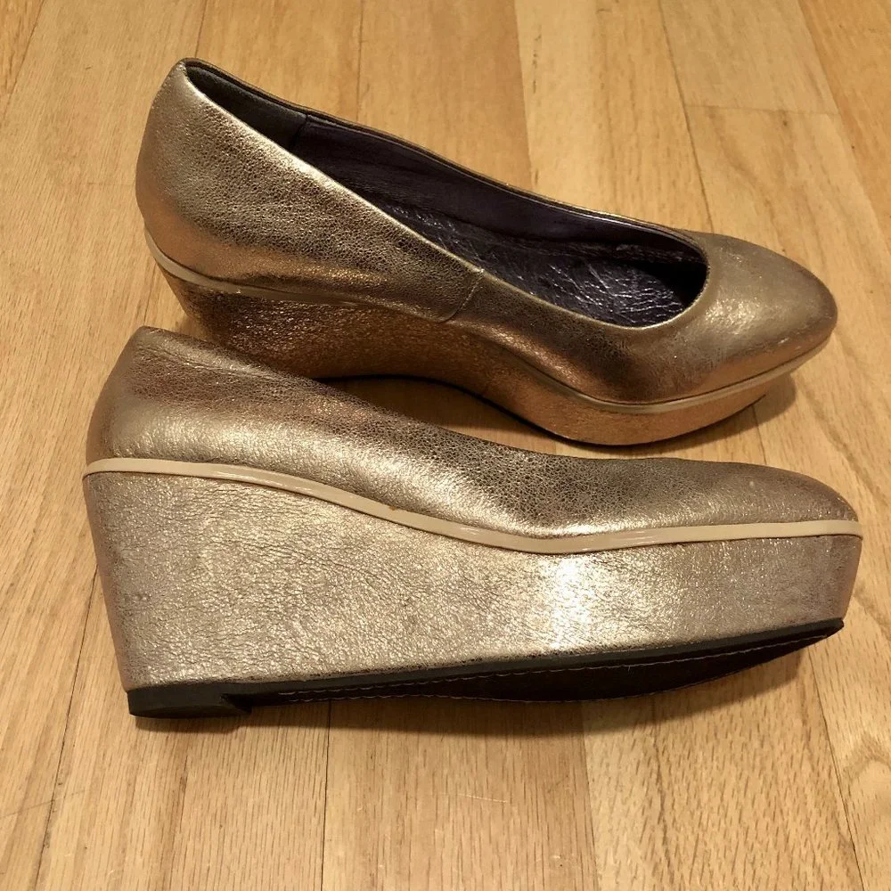Anthropologie gold gilt